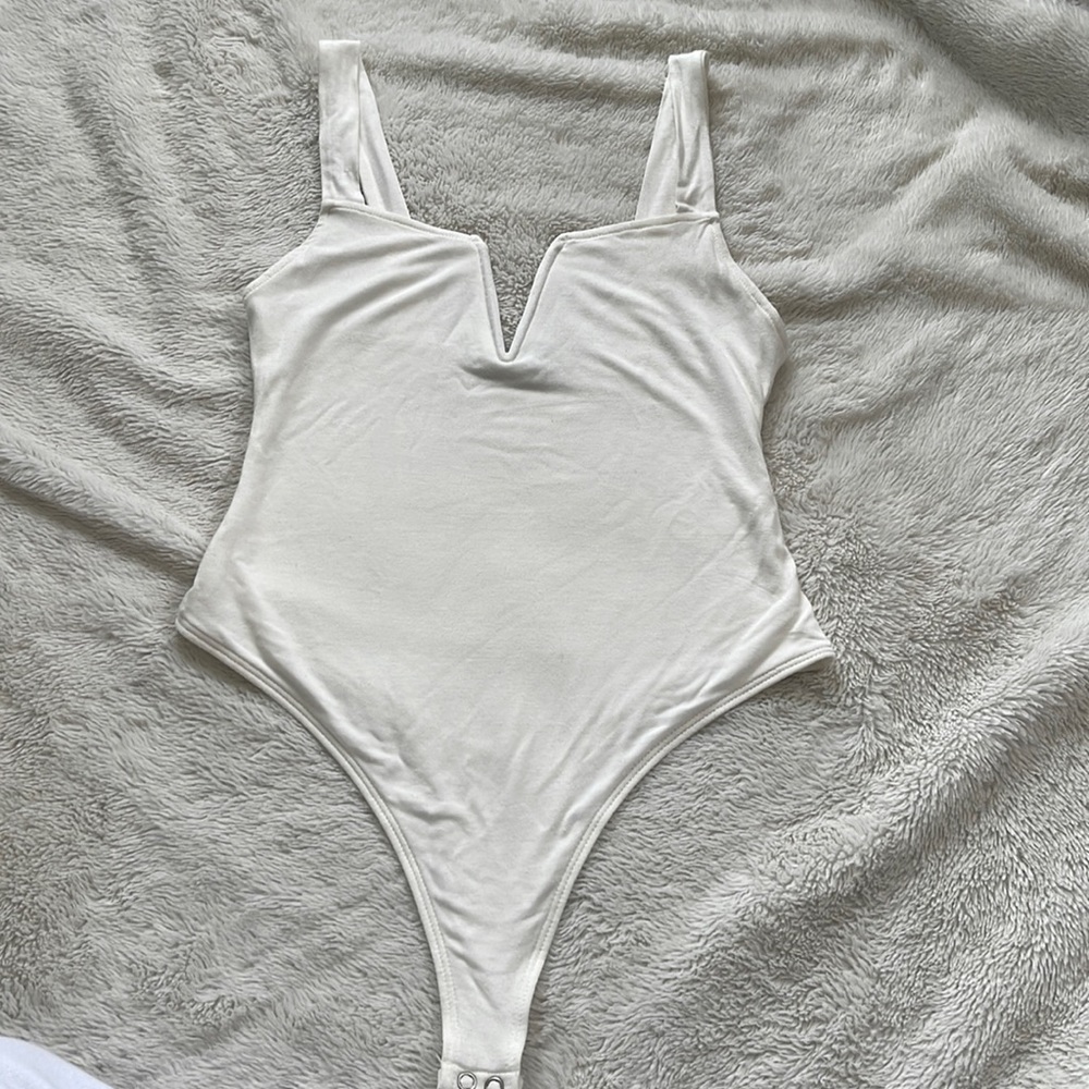 Women’s beige bodysuit size s